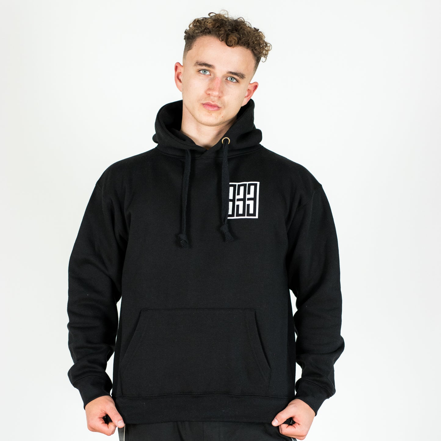 model wearing black skateboarding hoody