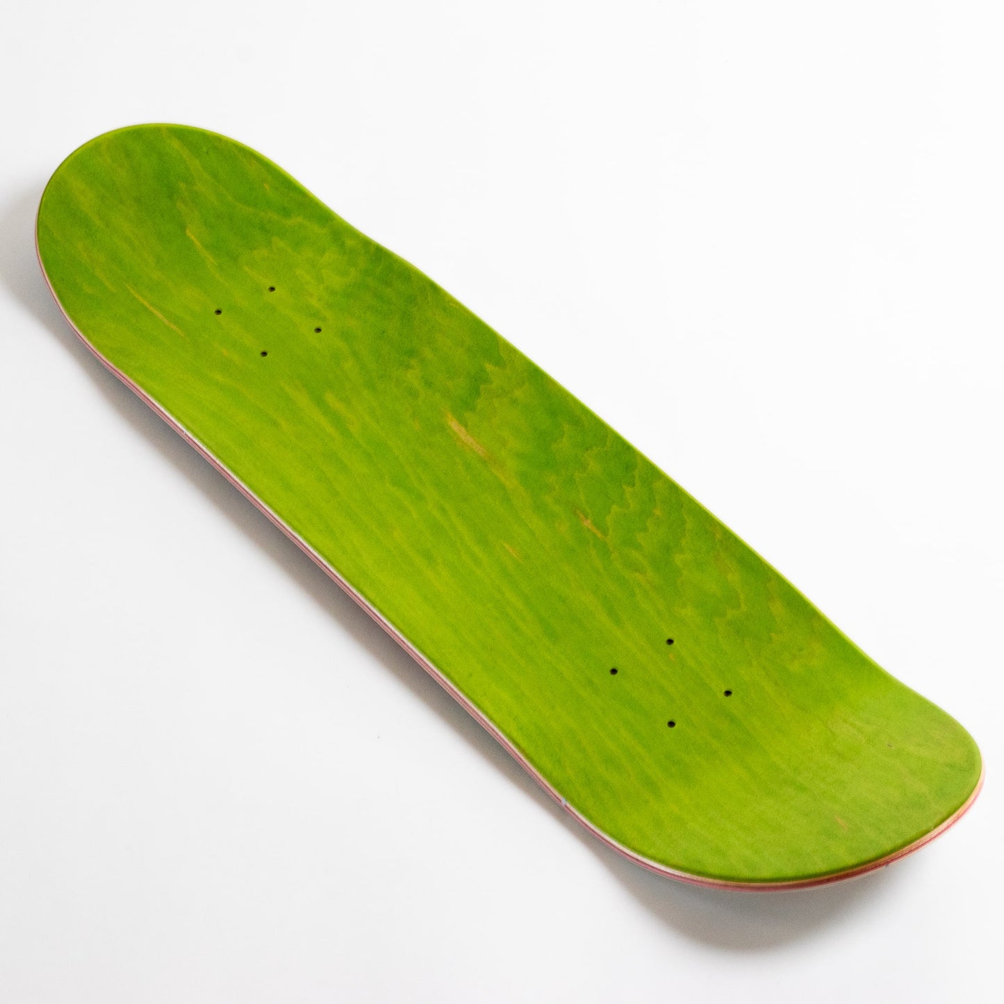top green ply triple 3 skateboards deck on a white background