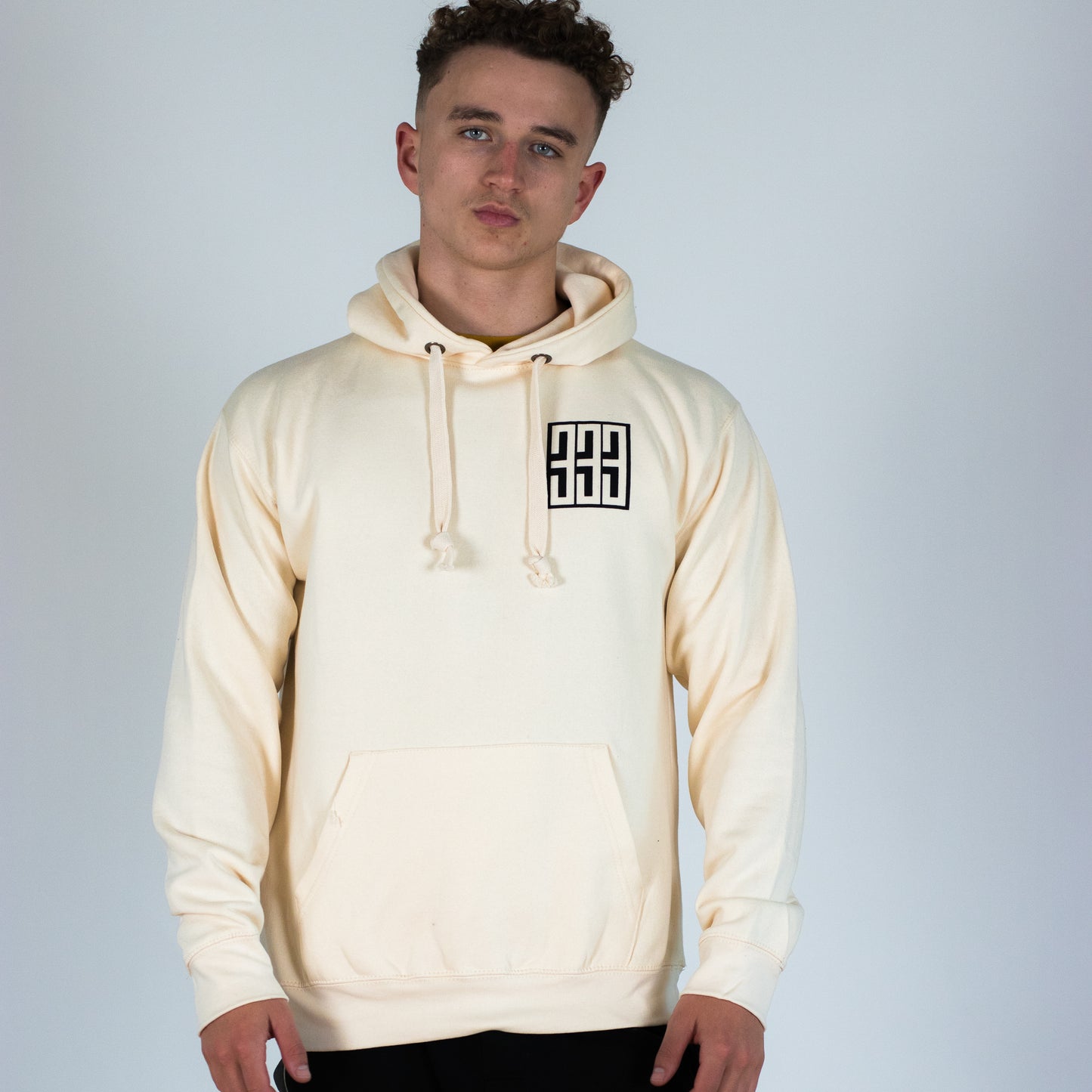 ivory boxed triple 3 skateboards hoody worn by model