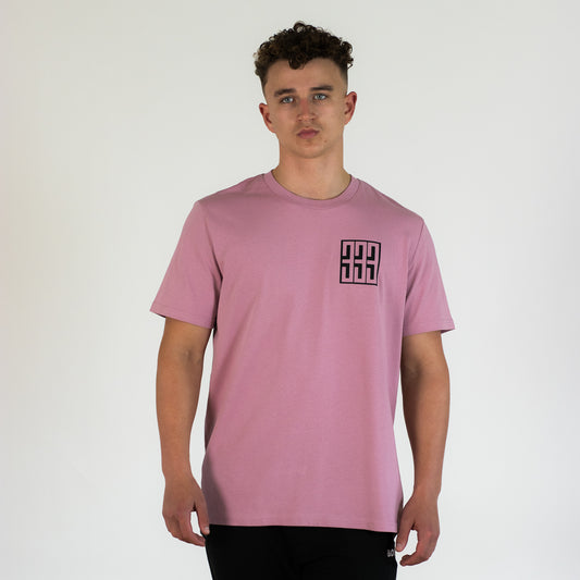 model wearing pink boxed t shirt