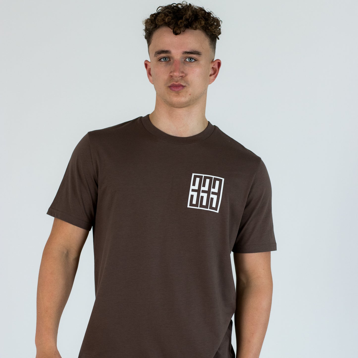 model wearing triple 3 mocha t shirt