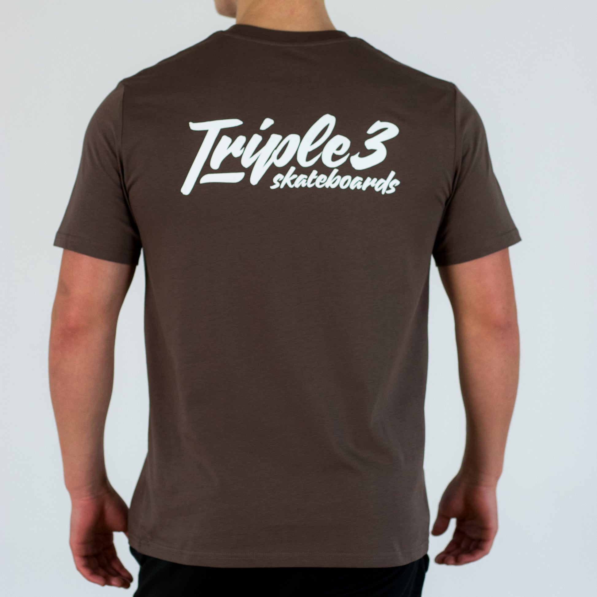 model-wearing-triple-3-skateboards-t-shirt