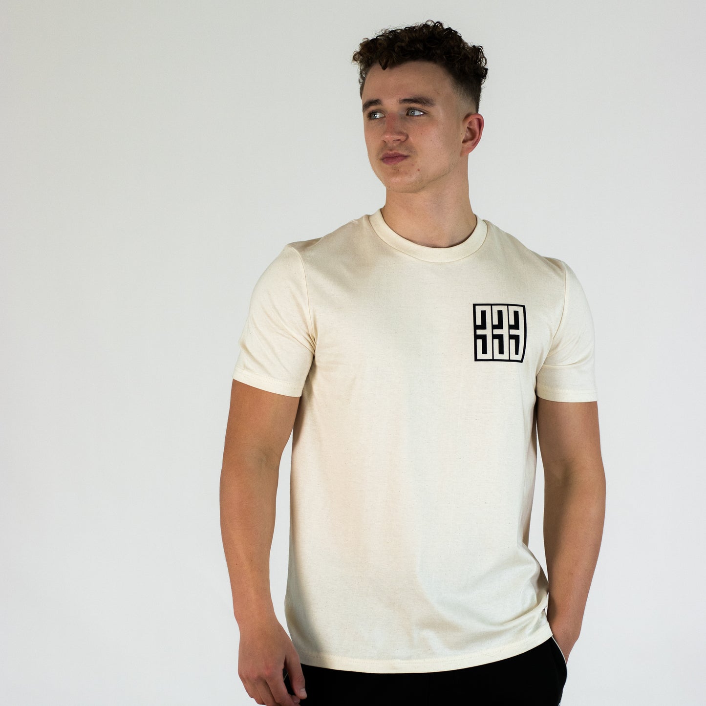 model wearing natural 333 boxed t shirt