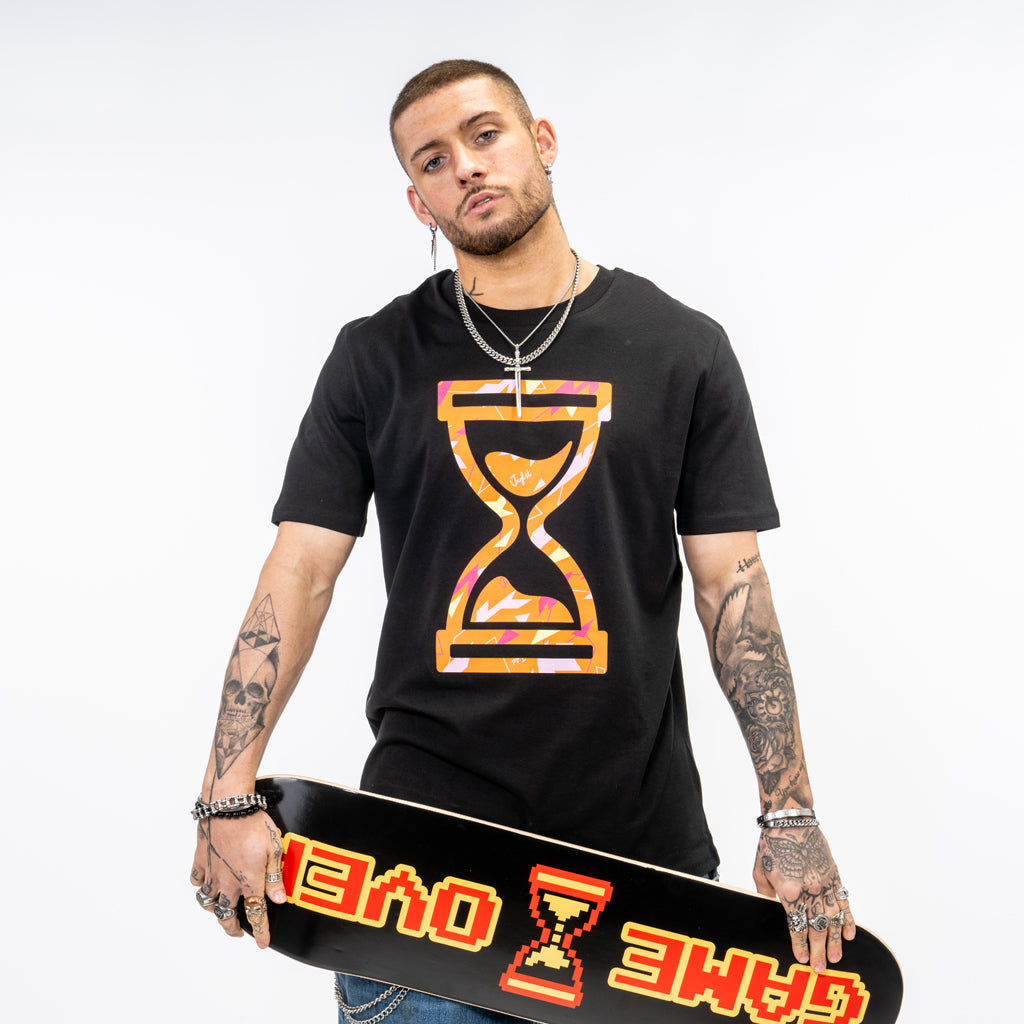 Orange Camo design on a black organic skate tee