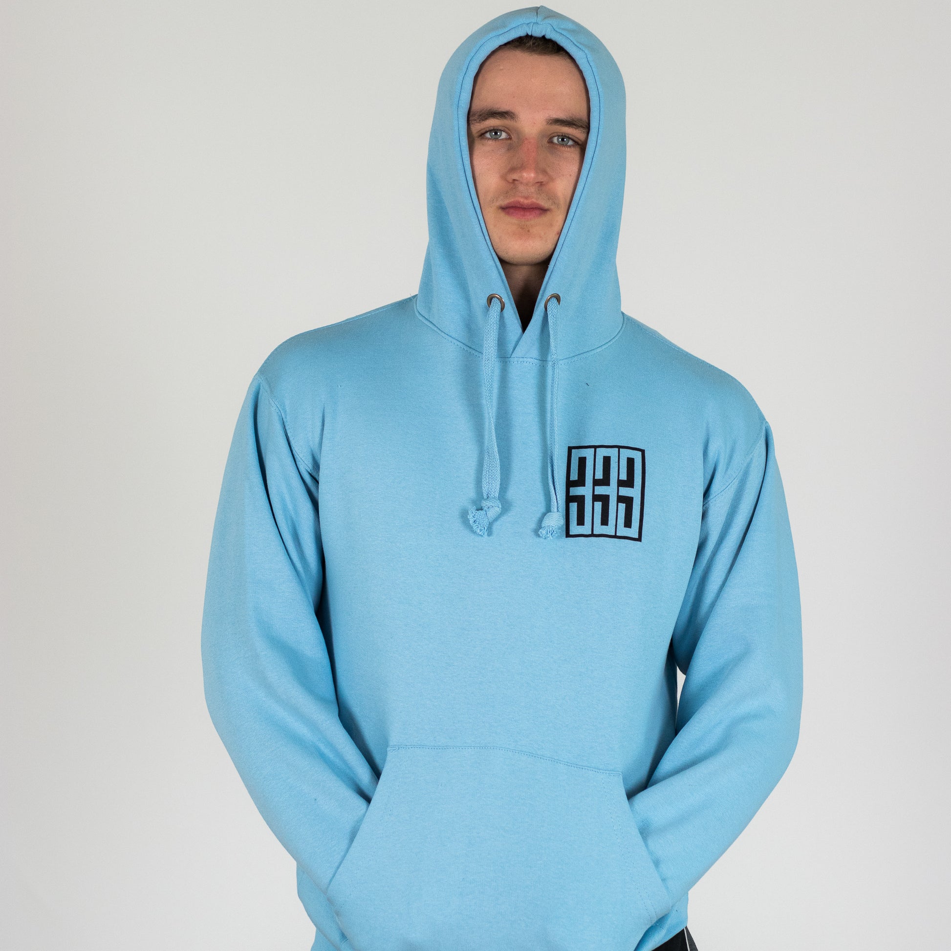 model wearing powder blue hoody