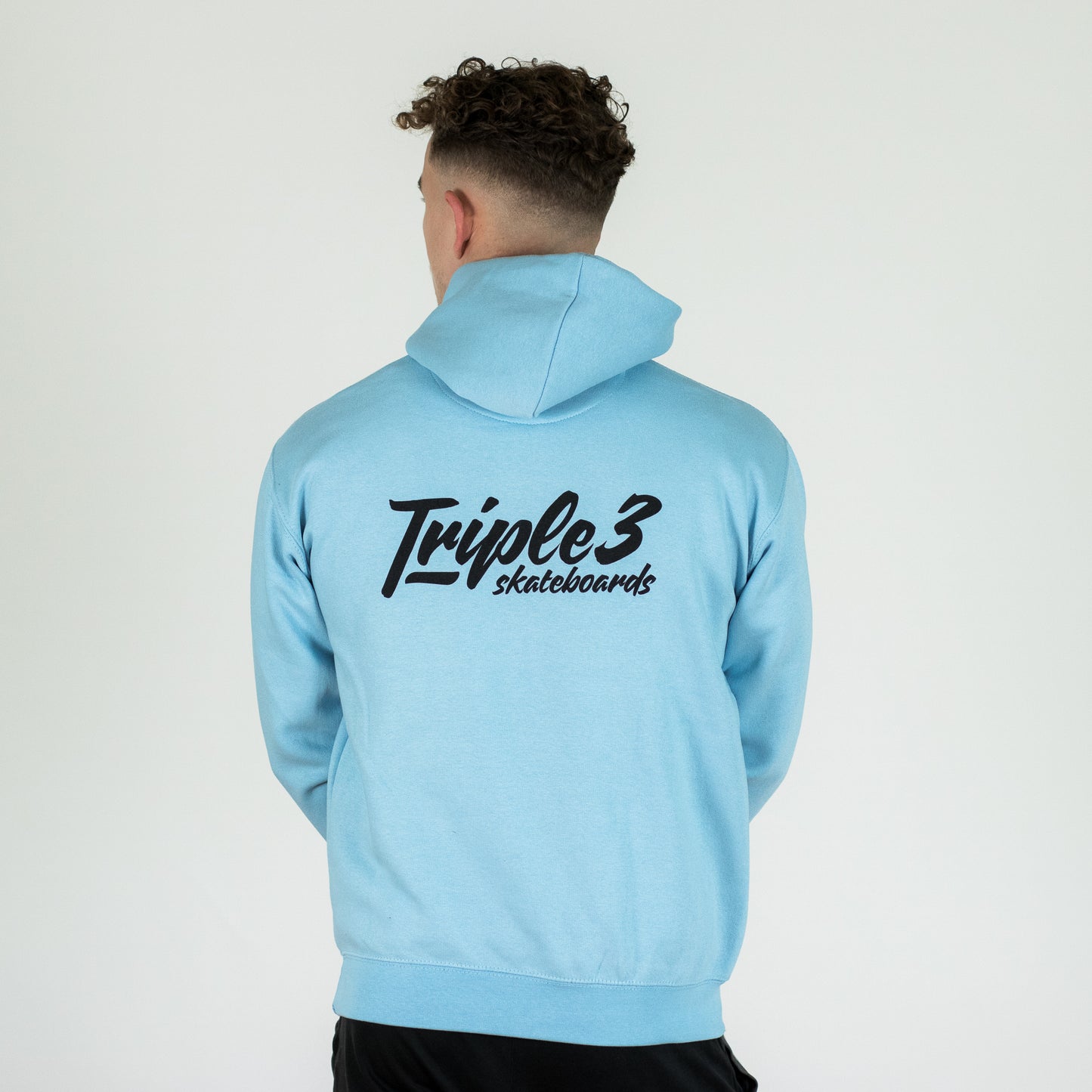 powder blue triple 3 skateboards hoody back worn by model